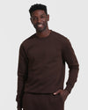 Man in Dark Oak Fleece French Terry Pullover Crew Neck.
