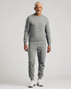 Man wearing Dark Heather Gray Pullover Fleece Crew & Jogger 2-Pack.