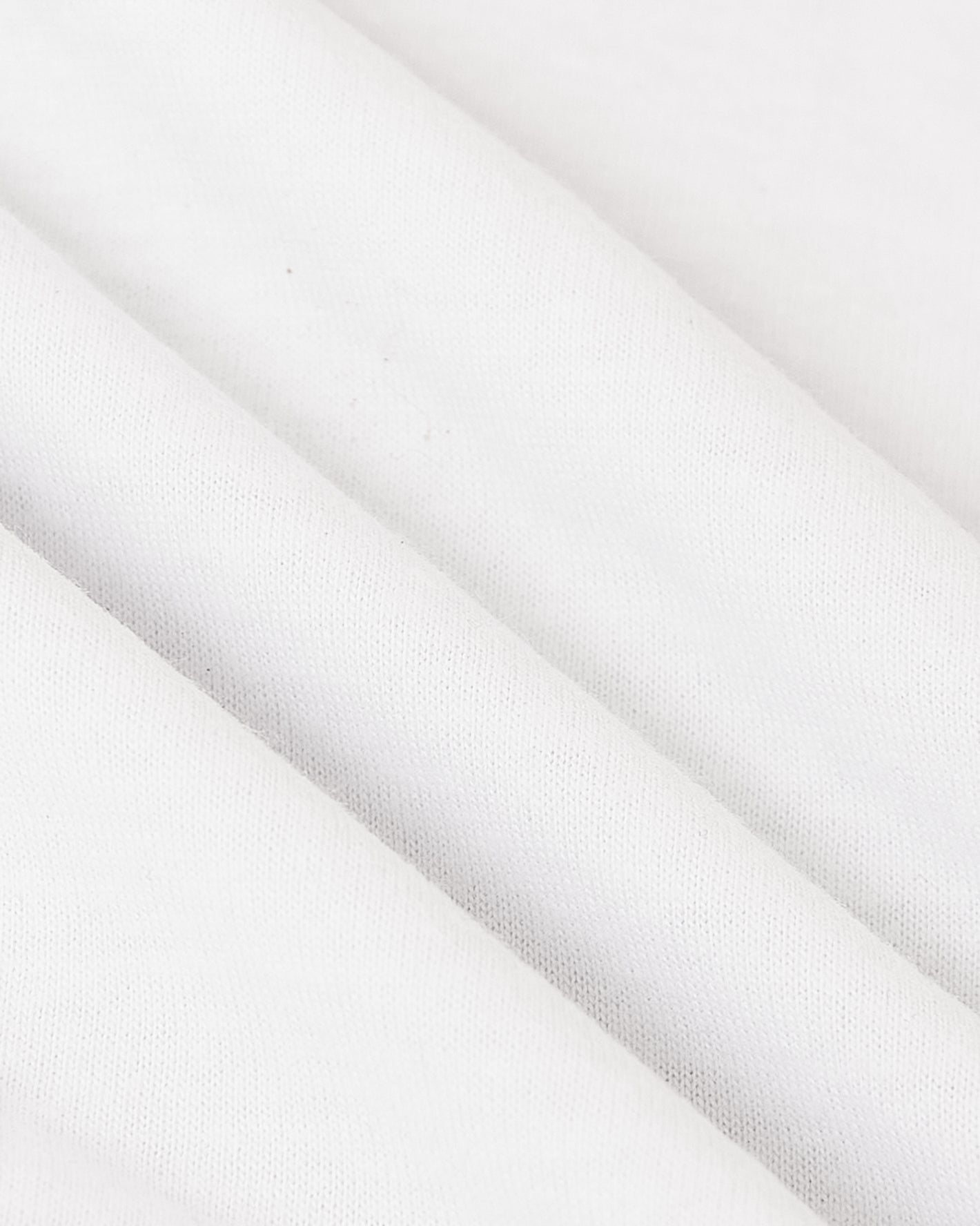 White Long Sleeve Polo, close-up of soft, draped fabric.
