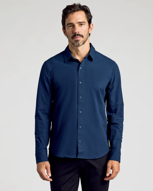 Navy Commuter Long Sleeve Shirt worn by man, arms relaxed.