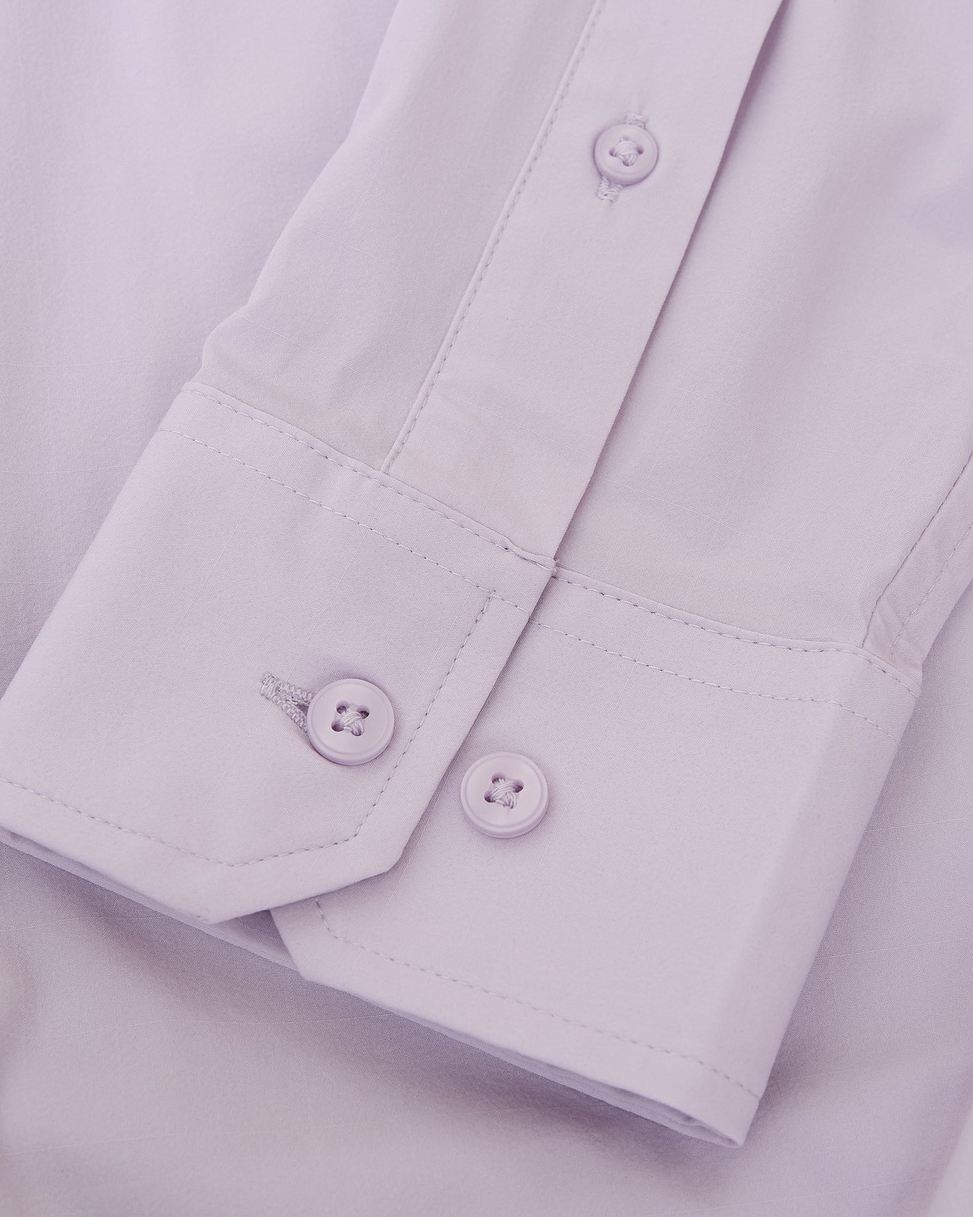 Orchid Long Sleeve Lightweight Dress Shirt cuff with buttons and stitching.