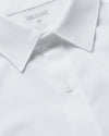 Black & White Long Sleeve Performance Dress Shirt 2-Pack, featuring a white button-front and pointed collar.