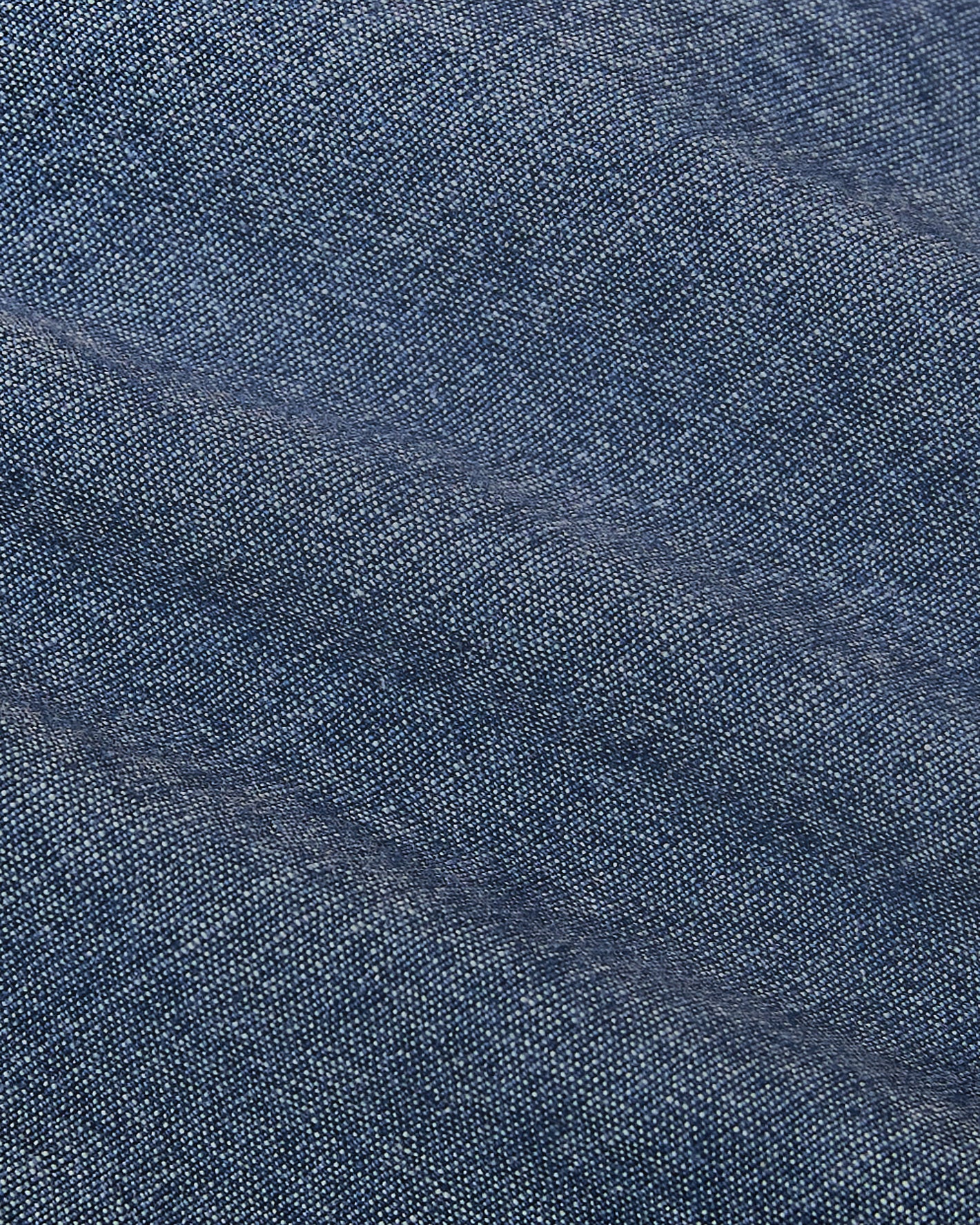Light Indigo Wash Long Sleeve Chambray Shirt fabric close-up, showcasing weave.