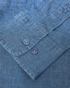 Light Indigo Wash Long Sleeve Chambray Shirt cuff with visible stitching.