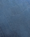 Light Indigo Wash Long Sleeve Chambray Shirt close-up of denim pocket stitching.