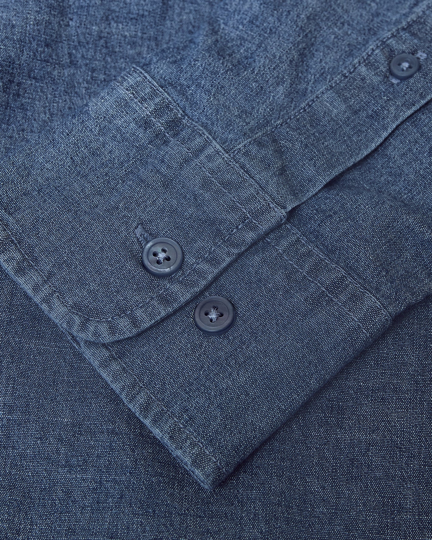 Medium Indigo Wash Long Sleeve Chambray Shirt sleeve cuff with buttons.