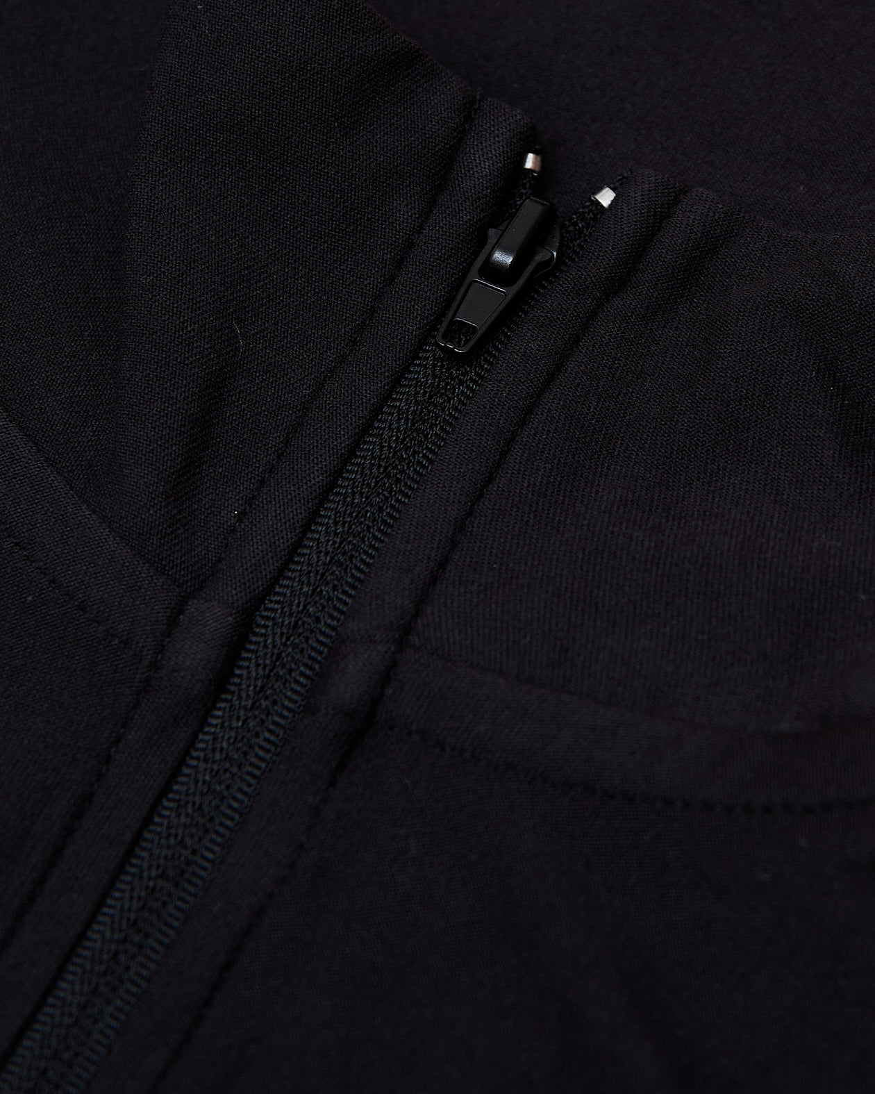 Black Active Quarter Zip Shirt with close-up of black zipper detail.