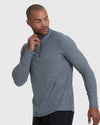 Man wearing Heather Navy Active Quarter Zip Shirt with black workout pants.