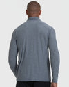 Man wearing Heather Navy Active Quarter Zip Shirt, showcasing its athletic fit.