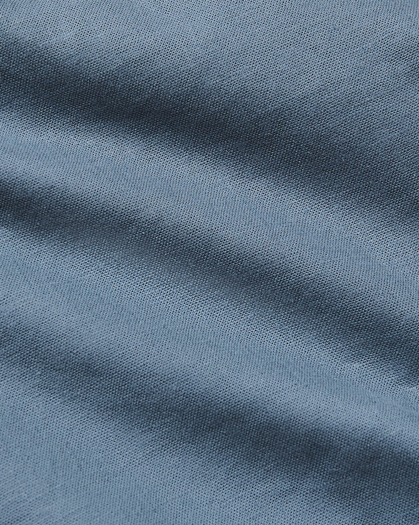 Fiord Long Sleeve Linen Shirt fabric showcasing its breathable knit texture.