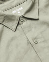 Mossy Oak Long Sleeve Linen Shirt with collar and buttons visible.