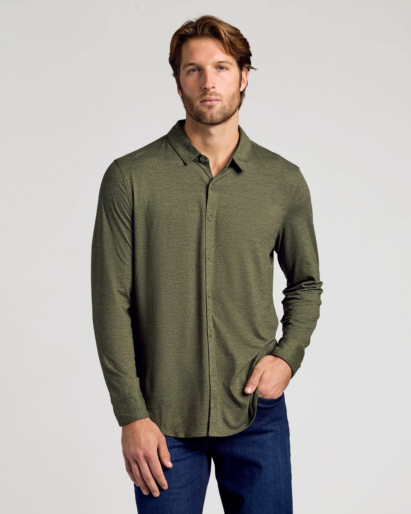 Model wears Dark Heather Military Green Long Sleeve Do-It-All Comfort Shirt.