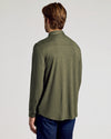 Man wearing Staple Long Sleeve Do-It-All Comfort Shirt, back view.