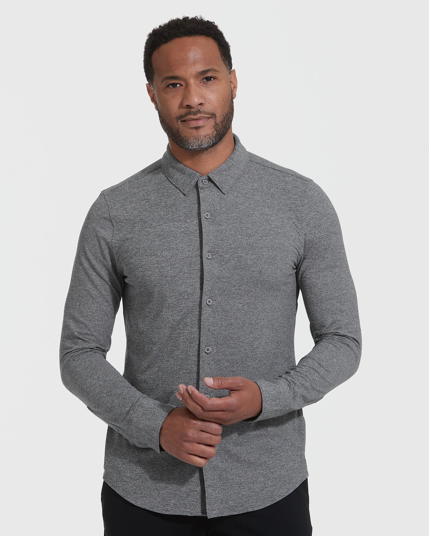 Model wearing Long Sleeve Do-It-All Comfort Shirt, showcasing its relaxed fit.