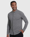 Man in Heather Gray Long Sleeve Do-It-All Comfort Shirt, smiling confidently.