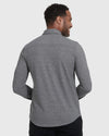 Back view of man in Heather Gray Long Sleeve Do-It-All Comfort Shirt.