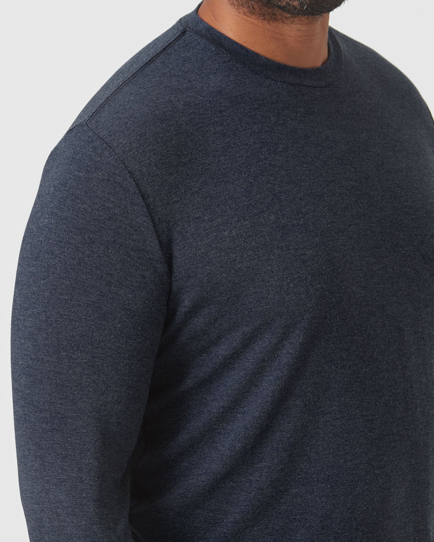 Heather Navy Long Sleeve Loungewear Tee on model's upper torso.