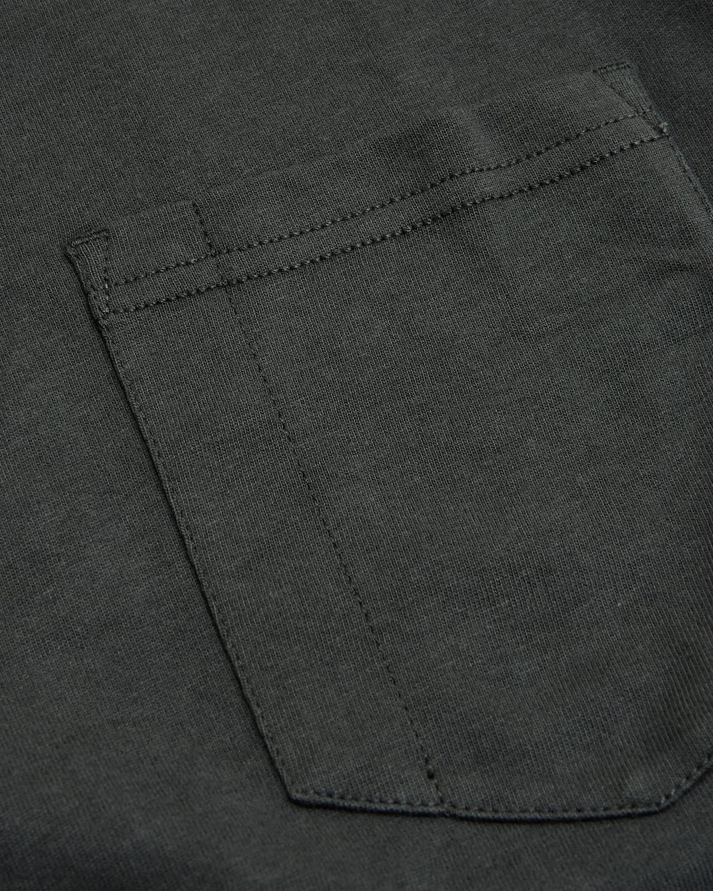 Carbon Heavyweight Long Sleeve Pocket Crew stitching detail on chest pocket.