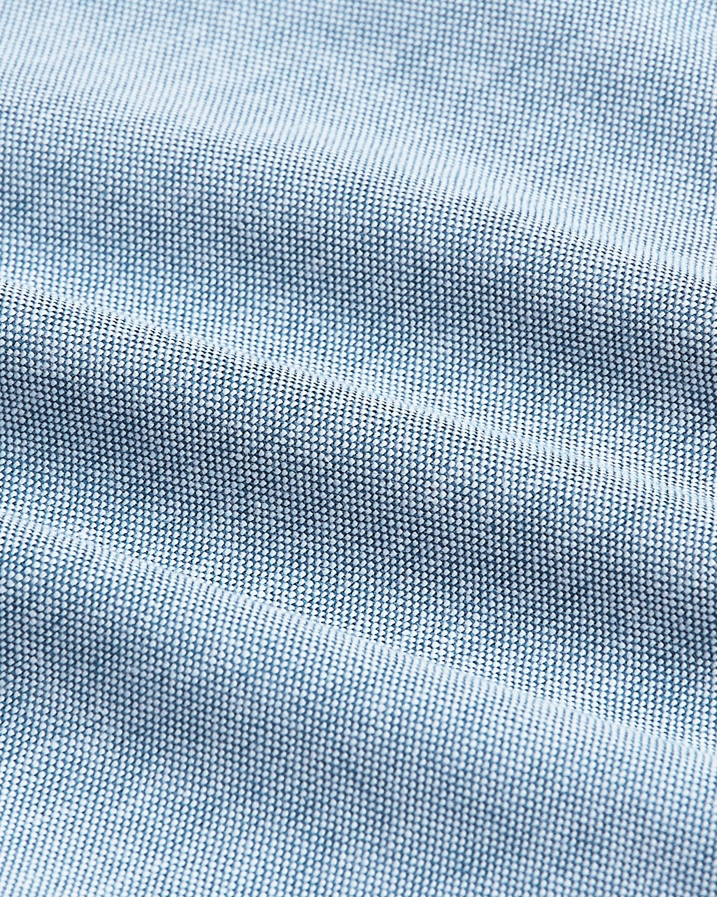 Harbor Stretch Oxford Shirt fabric detail showing tight weave and gentle folds.
