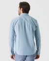 Rear view of man in Harbor Stretch Oxford Long Sleeve Shirt.