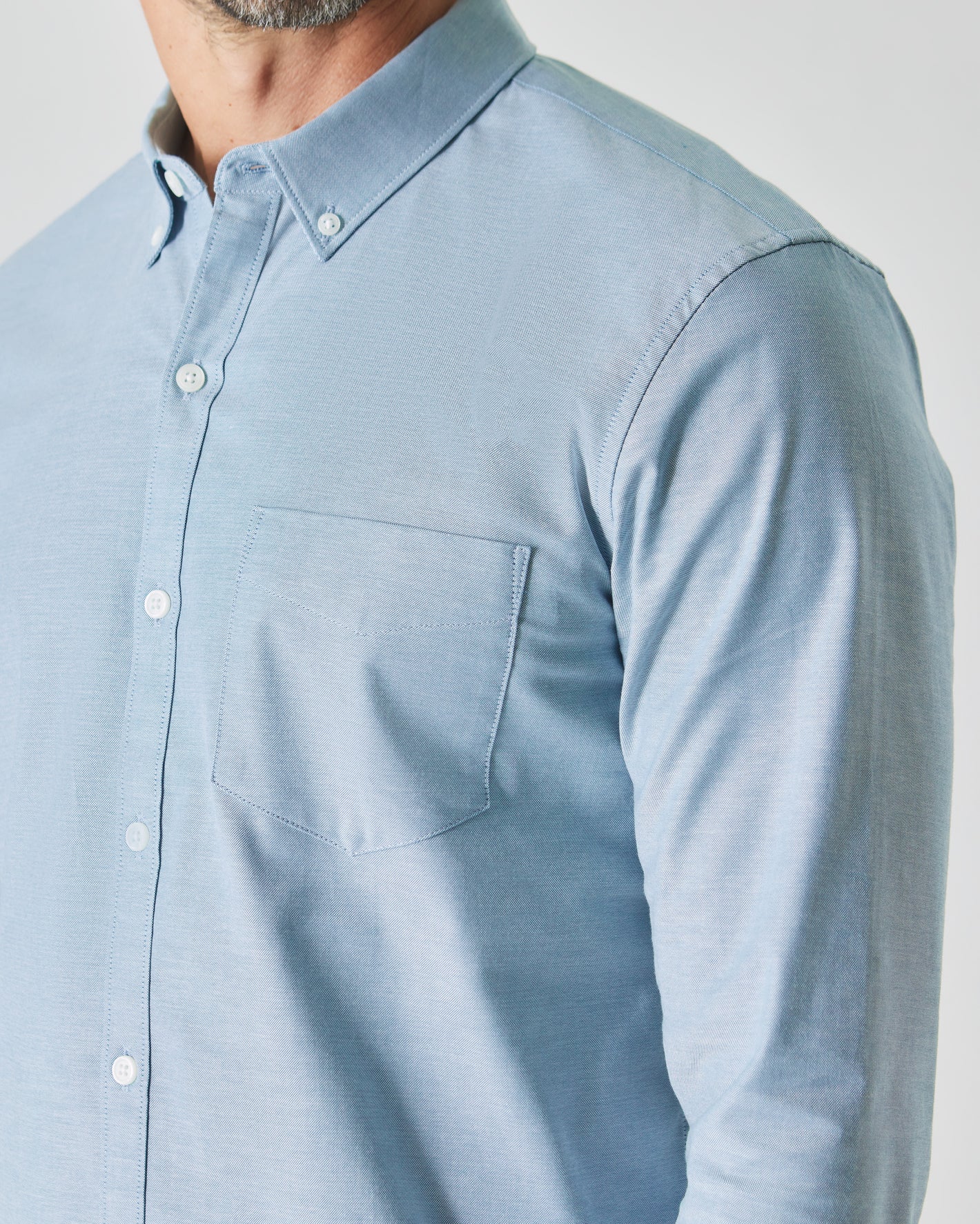Harbor Stretch Oxford Long Sleeve Shirt showcasing collar, buttons, and chest pocket.