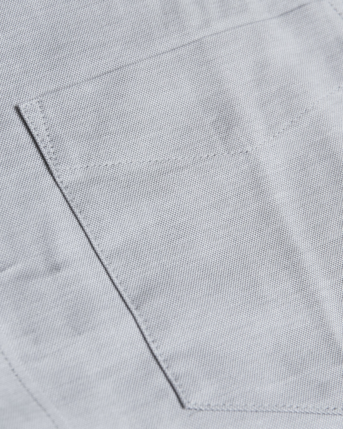 Light Gray Stretch Oxford Shirt with top-stitched patch pocket detail.