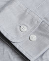 Light Gray Stretch Oxford Shirt cuff with buttons and fine texture.
