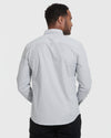 Man in Light Gray Stretch Oxford Long Sleeve Button Up Shirt.