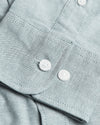 Moss Stretch Oxford Long Sleeve Shirt close-up with buttons and stitching.