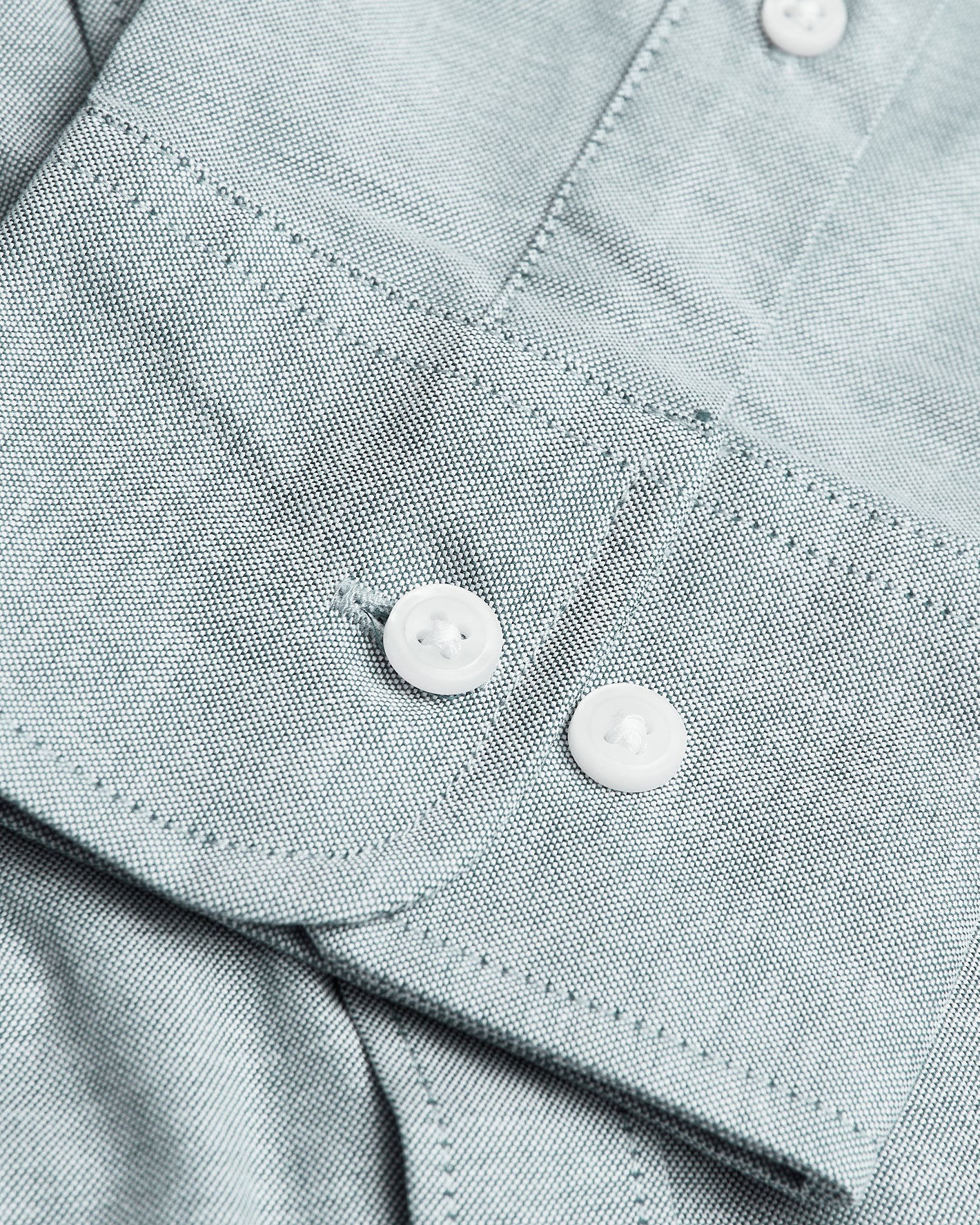 Moss Stretch Oxford Long Sleeve Shirt close-up with buttons and stitching.