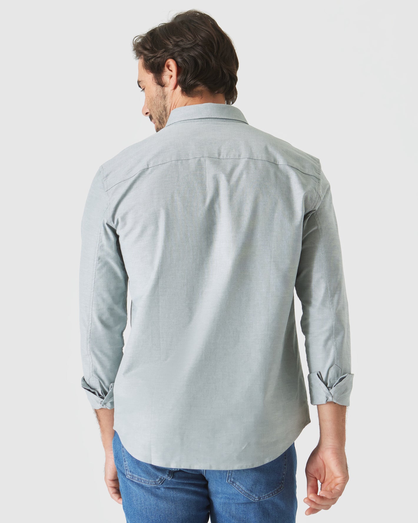 Moss Stretch Oxford Long Sleeve Shirt back view, rolled sleeves.