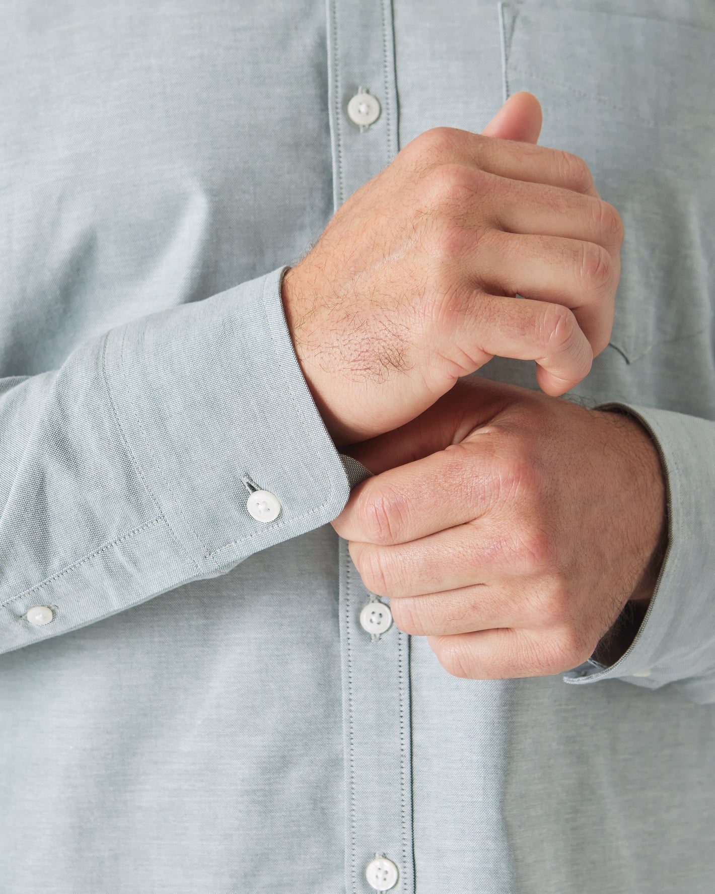 Moss Stretch Oxford Long Sleeve Shirt with buttoned cuff detail.