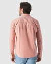 Man wearing Peach Long Sleeve Oxford Shirt with jeans, back view.