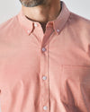 Man wearing Peach Long Sleeve Oxford Shirt with button-down collar.