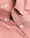 Peach Long Sleeve Oxford Shirt close-up with collar, white buttons visible.