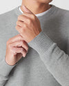 Heather Gray Pique Crew Sweater with ribbed cuffs and visible textured knit.