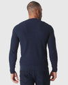 Heather Navy Pique Crew Sweater, back view on model, arms relaxed.