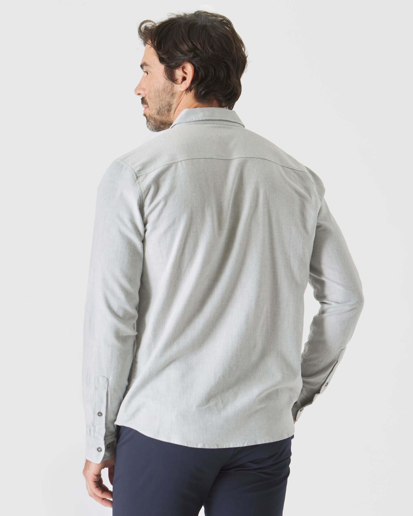 Back view of a man in Heather Gray Long Sleeve Lightweight Flannel Shirt.