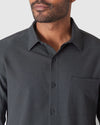 Man wearing Charcoal Heather Gray Long Sleeve Ripstop Commuter Shirt.