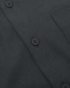 Close-up of Charcoal Heather Gray Long Sleeve Ripstop Commuter Shirt placket.