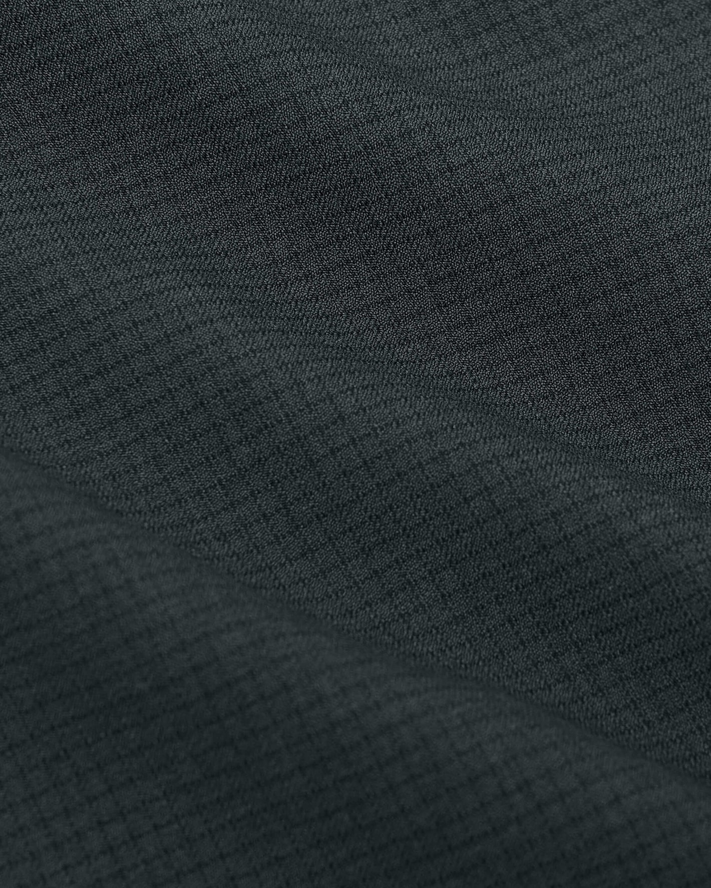Heather Navy Long Sleeve Ripstop Commuter Shirt's intricate woven texture close-up.