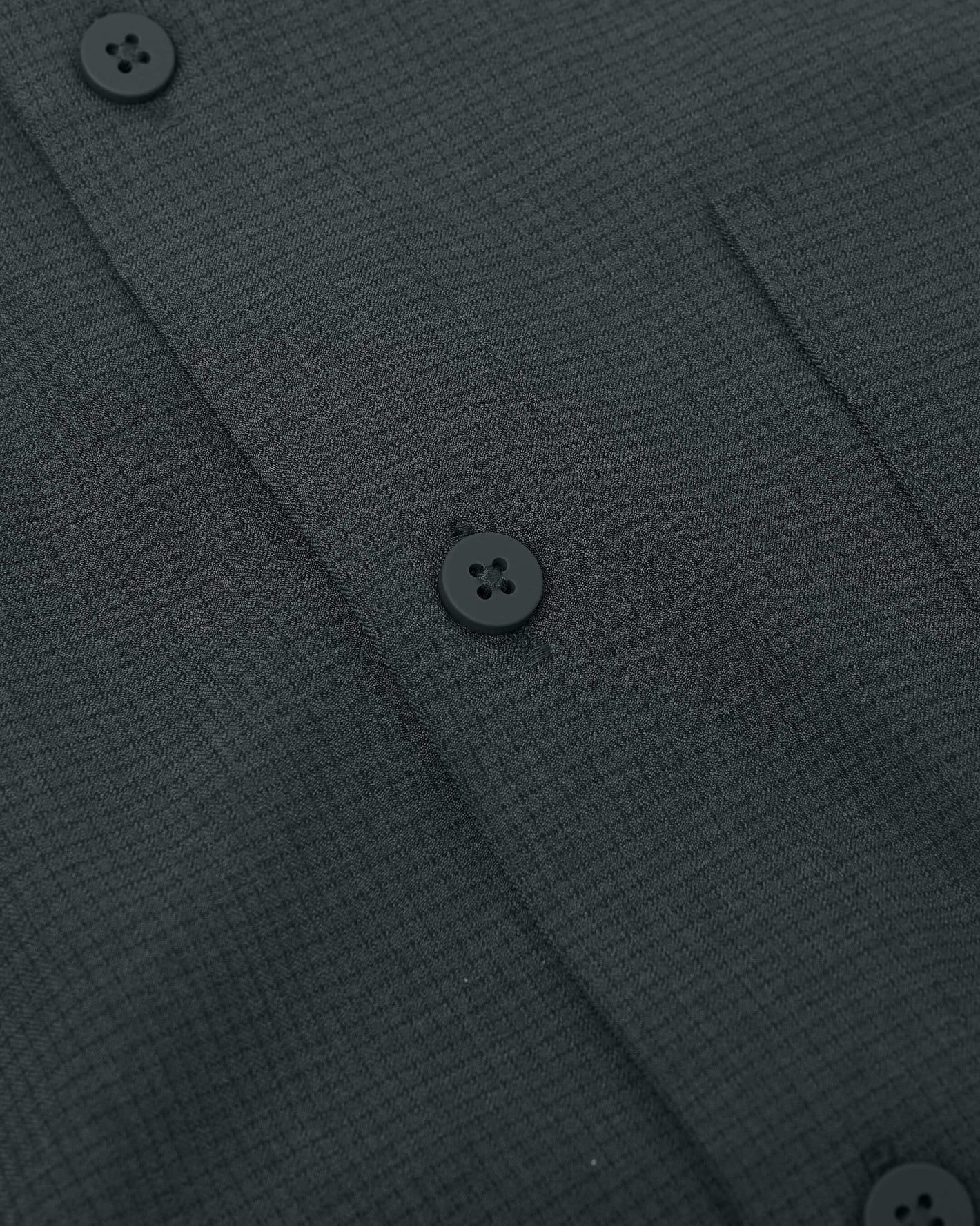 Heather Navy Long Sleeve Ripstop Commuter Shirt with grid texture and matte buttons.