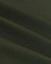 Olive Long Sleeve Ripstop Commuter Shirt fabric close-up, showcasing texture.