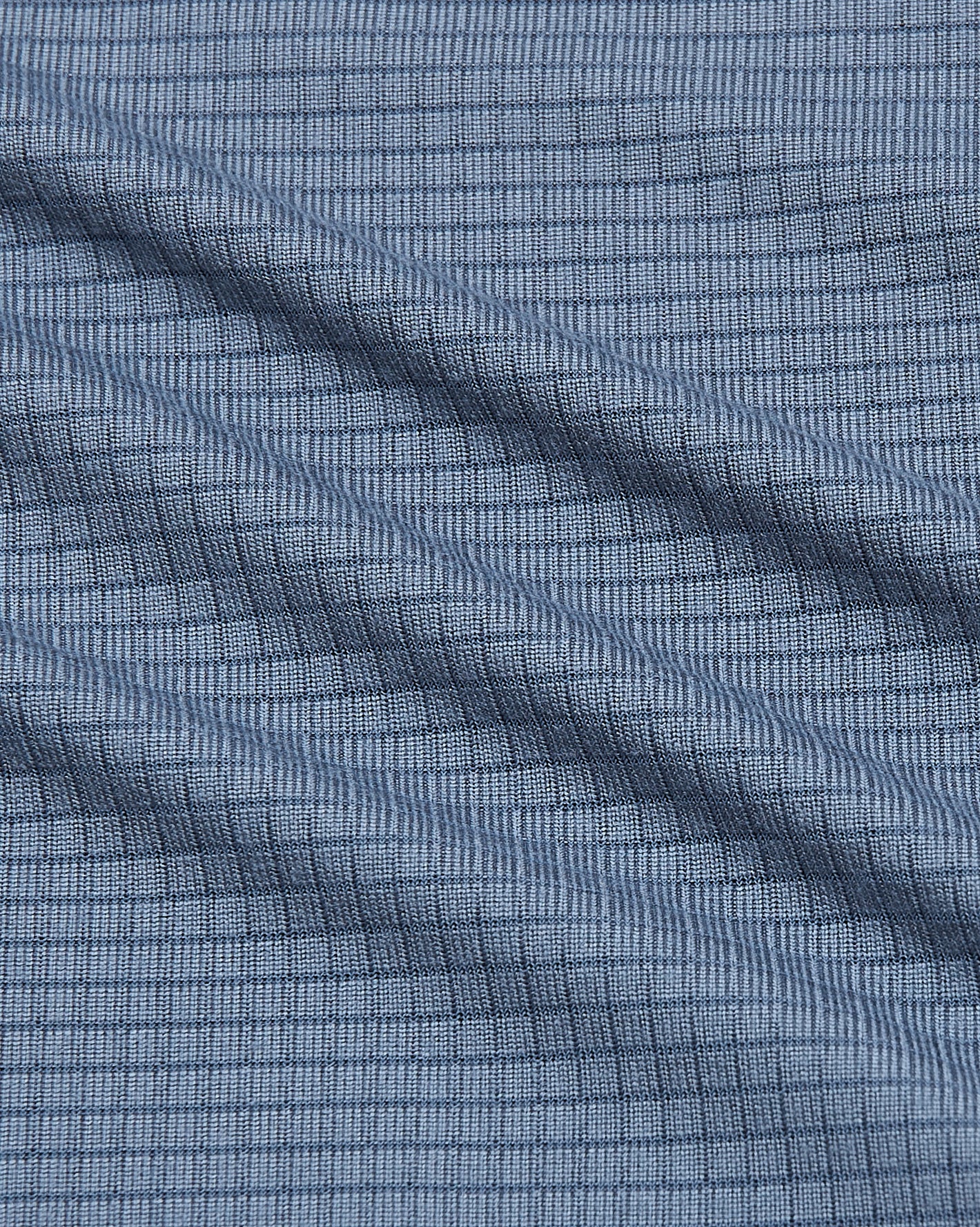 Fiord Long Sleeve Active Mesh Crew with blue grid-textured fabric close-up.