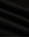 Close-up of Womens Ribbed Long Sleeve Scoop Neck Tee's textured black fabric.