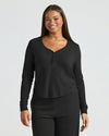 Woman modeling Womens Black Waffle Long Sleeve Boxy Henley set.