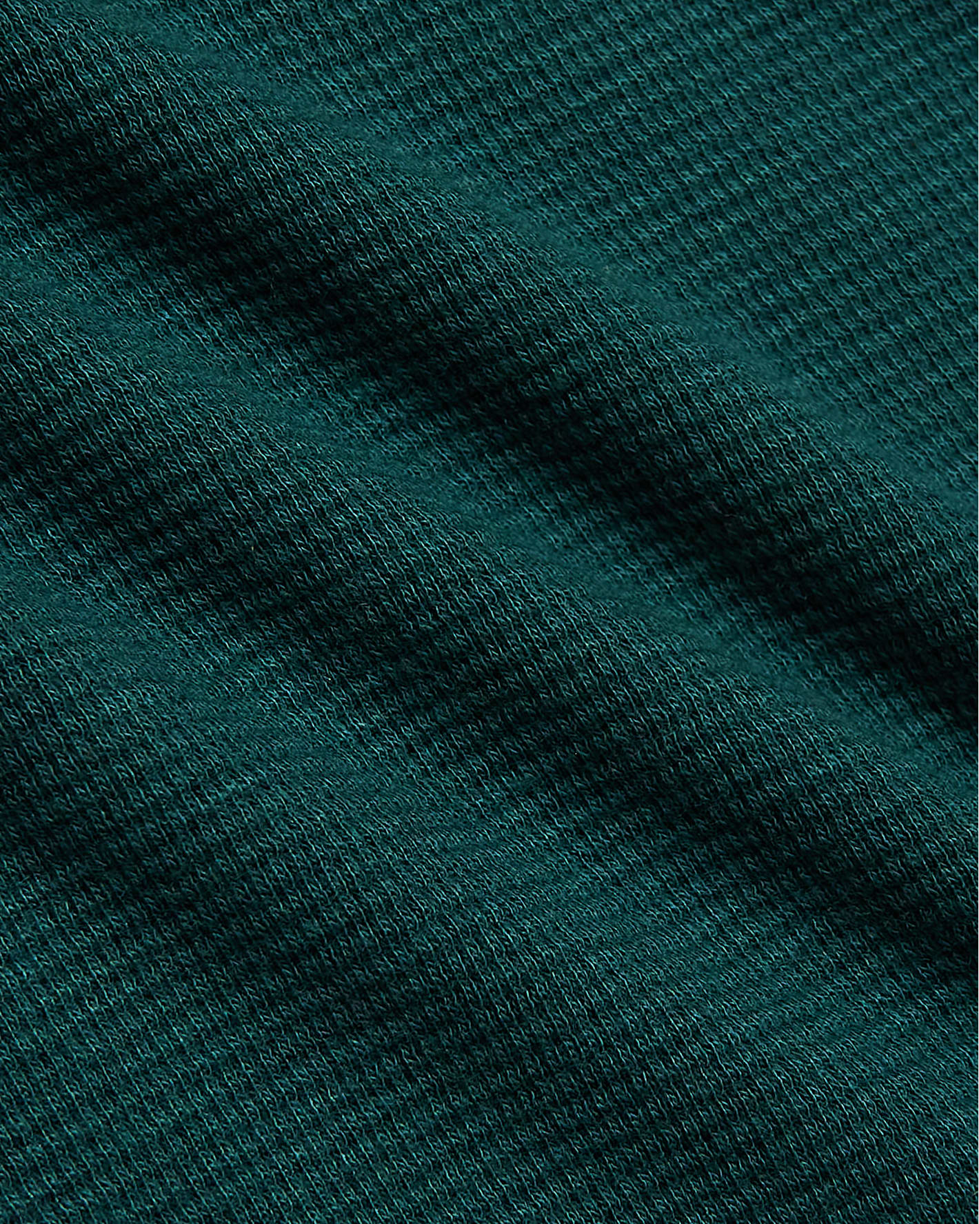 Women's Deep Emerald Waffle Long Sleeve Boxy Henley, showing fine knit texture.
