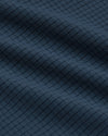 Close-up of Sleeveless Active Mesh Tank's textured dark blue fabric.