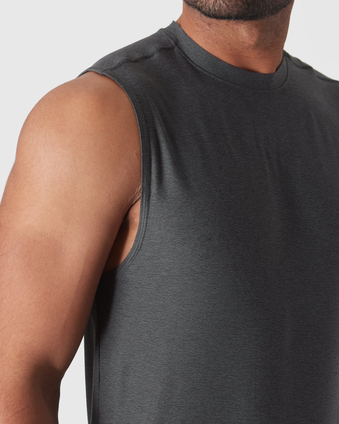 Charcoal Heather Gray Active Sleeveless Muscle Tee on man's upper body.