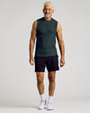 Middle-aged man modeling Dark Heather Forest Sleeveless Active Muscle Tee.
